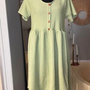 Farmhouse Frocks green midi dress with button up front and lace trim. Size S
